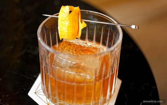 There's a cherry wrapped up in that orange peel – which is a nice little surprise. I'm not actually a fan of cherries in general – but within the context of this Old-Fashioned – it makes perfect sense.
