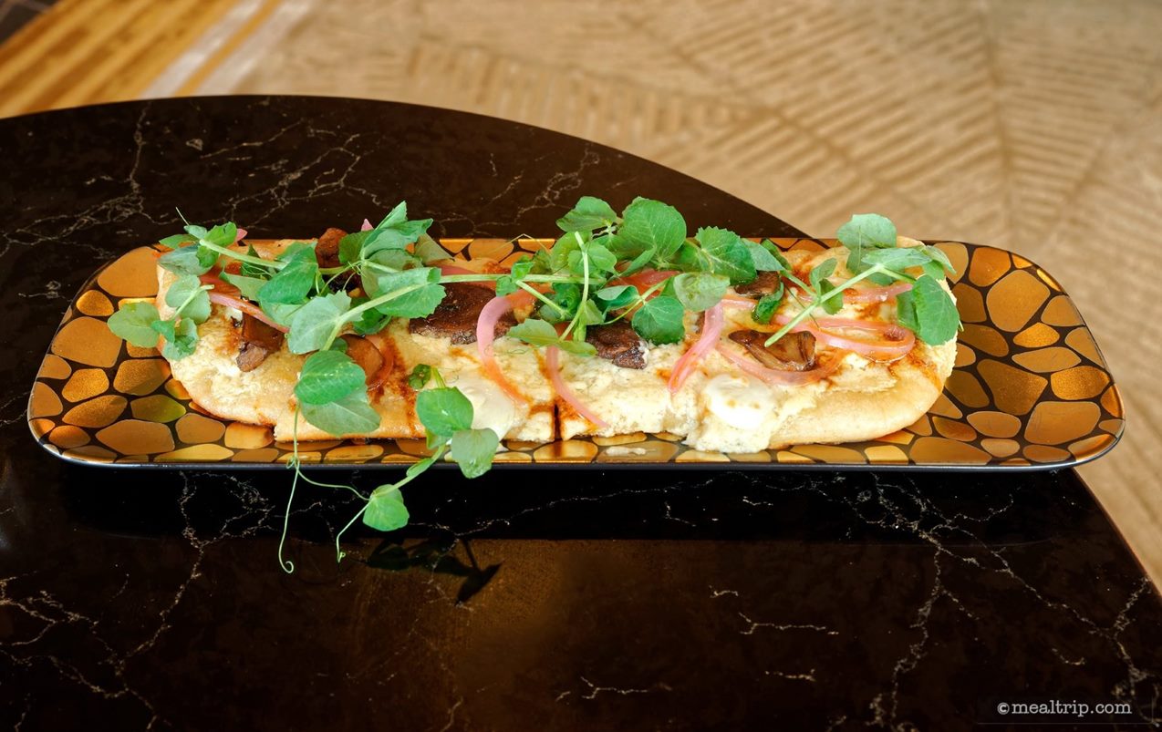 Everything at Geo-82 could be shared (naturally) but for comparison sake – the Funghi Flatbread was not as large as the flatbreads that you might find in the Appetizer section of Table Service menus around the Disney dining system. It was cut into six smaller slices, if I'm remembering that correctly.
