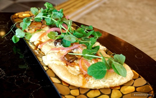 The greenage on top of the Funghi Flatbread at Geo-82 is very pretty – when it comes to eating a small slice – it's a little more practical to pull off greens and eat them as an accompaniment to the small bites of flatbread.