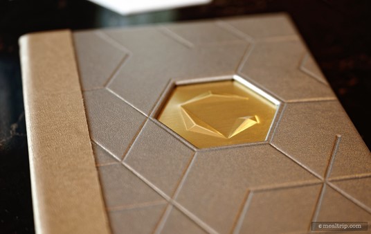 The Geo-82 Menu cover features the G icon in a gold hexagon. It's a really nice menu cover.