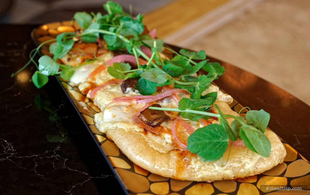 On our visit to Geo-82 (summer 2025) the Funghi Flatbread was the only item on the menu that was "served warm". I suspect, the "kitchen" area is not very large, and that they only have some form of toaster oven to work with.