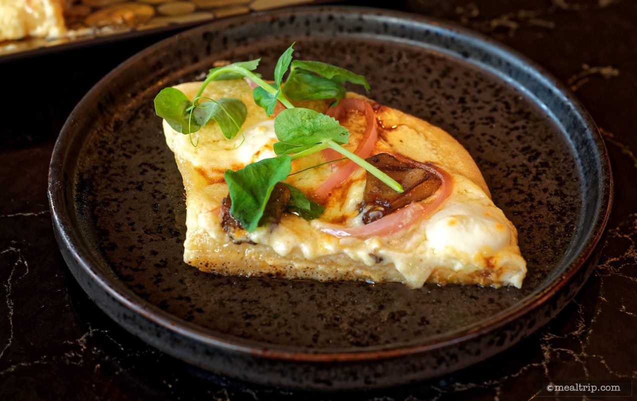 Each of the slices was just large enough to hold at least one roasted mushroom and a couple of pickled red onions – along with a sprig of micro greens.