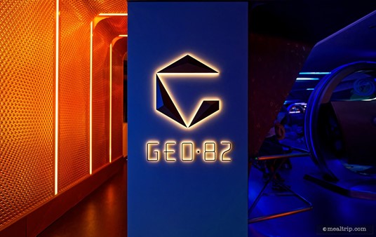 Ahhh... when you get someone to block the light from the outside door (on the left), you can get a cool photo of the Geo-82 Logo located at the entrance to the lounge. The dark blue space on the right is the "Project Tomorrow" area ... an interactive gallery of sorts that guests walk into – after the Spaceship Earth ride has ended.