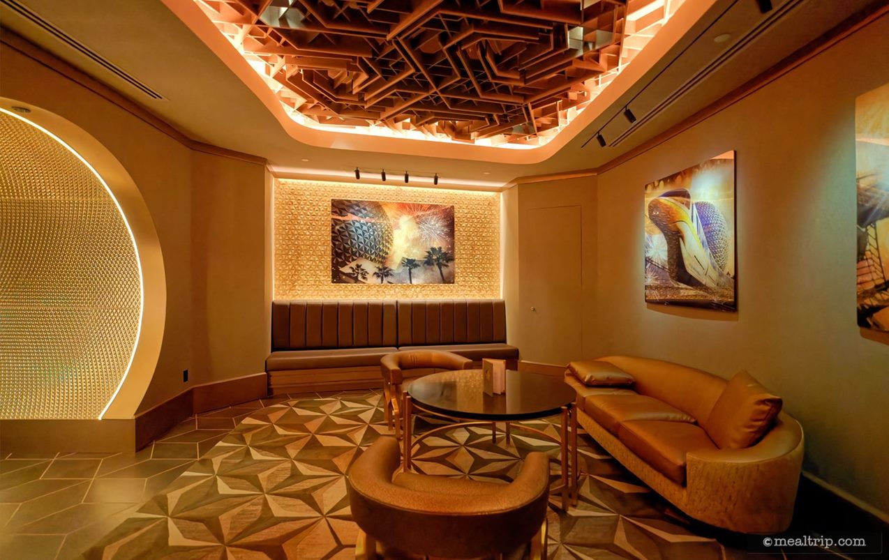 The second floor waiting area has some seating options and some artwork hanging on the walls. These appear to be composite photos printed on some kind of metallic substrate.
