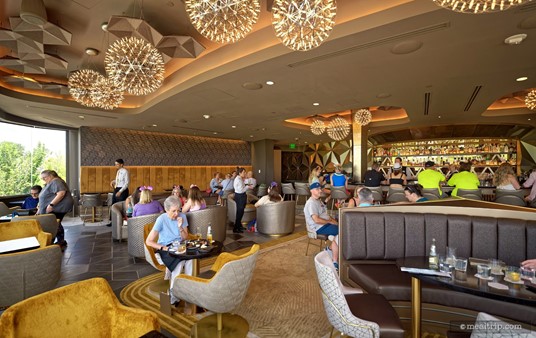 Here's a good photo showing the mix of seating options. For me, the swivel chairs near the window are the best seats in the house... because you can look out the window, look at your table, and look at the lounge area – all without leaving your seat.