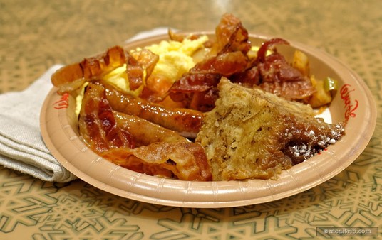 Scrambled Eggs, Bacon, Sausage, Breakfast Potatoes and Cinnamon French Toast Bread Pudding are all part of the Sunshine Seasons Breakfast Platter.