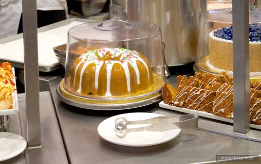 Although this bunt cake under glass is plastic, pre-cut versions of the 
spice cake area available (to the right and in front of the plastic 
cake).