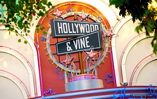 The Hollywood & Vine sign, high above the entrance to the restaurant.
