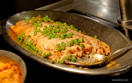 On most day's, there is a salmon of some type available. Here, a baked, maple glazed version with peas and onions is pictured.