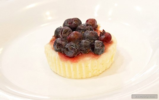 The mini blueberry cheesecake plated by itself.